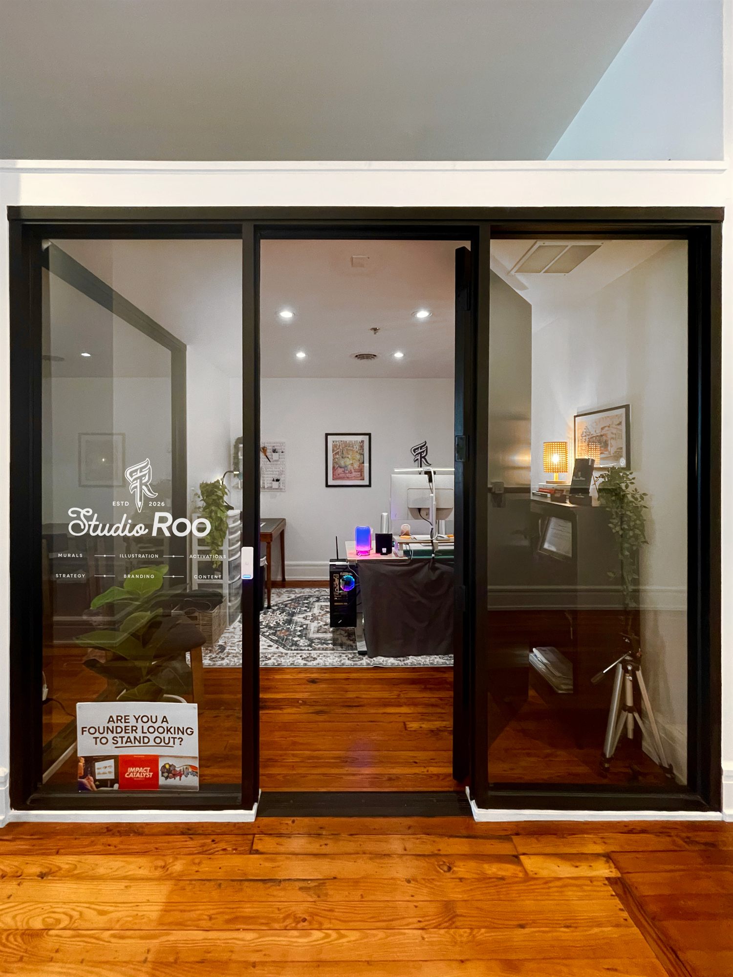The Studio Roo workspace, with the studio wordmark etched on the glass doors