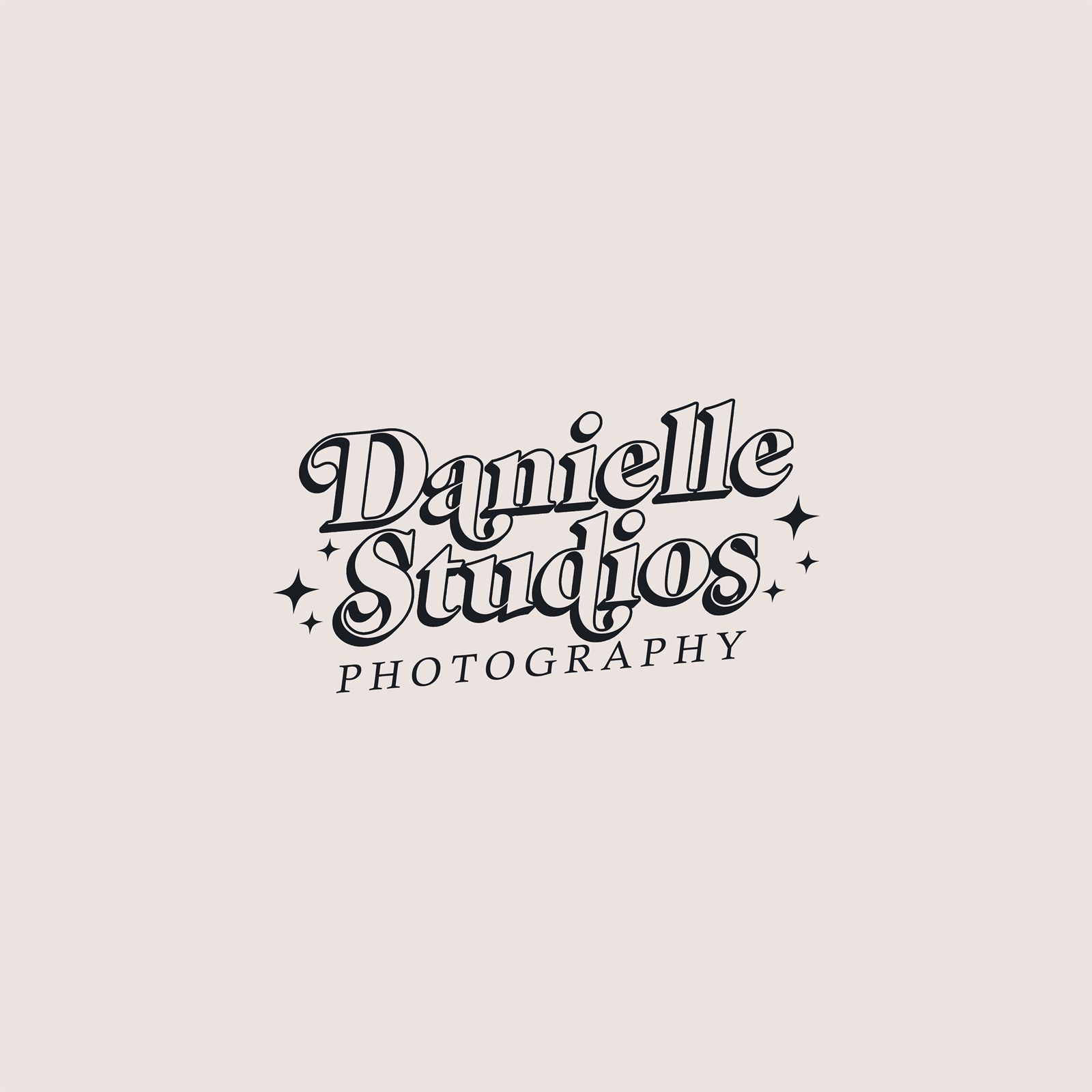 Dimensional version of the Danielle Studios wordmark in dark ink on a warm gray background